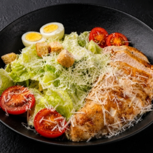 Caesar salad with chicken breast